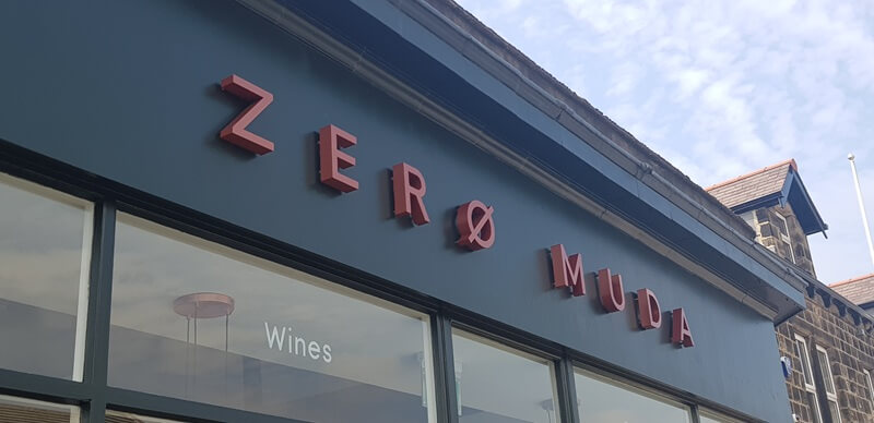 An image of the Zero Muda exterior signage.